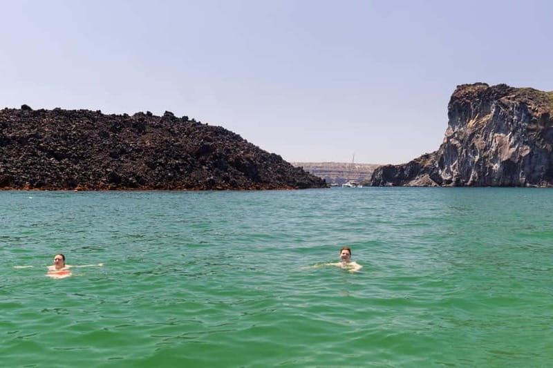 Santorini: Catamaran Cruise with Fresh Meal & Open Bar - The volcanic hot springs, with realistic expectations
