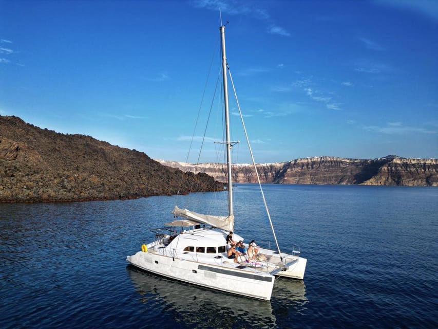 Santorini: Catamaran Cruise with Greek BBQ and Drinks - The BBQ, drinks, and onboard service