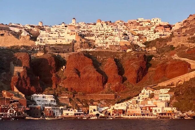 Santorini Catamaran Cruise with Greek Meal, Open-Bar and Sunset - Palea Kameni hot springs: warm water with a sulfur smell
