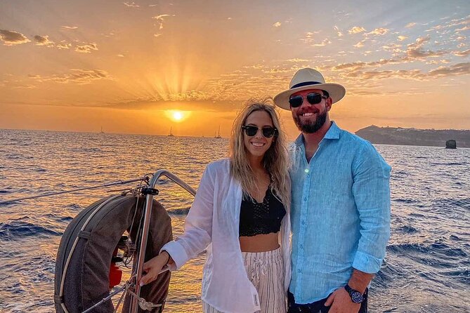 Santorini Catamaran Cruise with Greek Meal, Open-Bar and Sunset - Sunset from the water is the grand finish