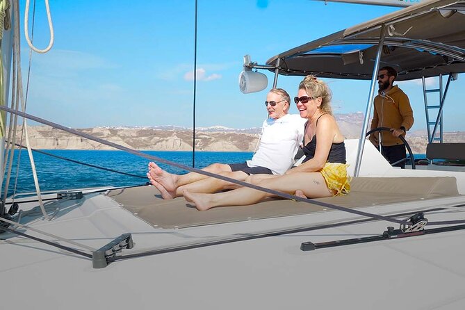 Santorini Catamaran Cruise with Greek Meal, Open-Bar and Sunset - Group size, crew, and comfort on board