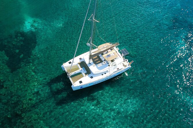 Santorini Classic Catamaran Cruise with BBQ, Drinks and Transfers - Sunset sailing: beautiful, but plan for wind
