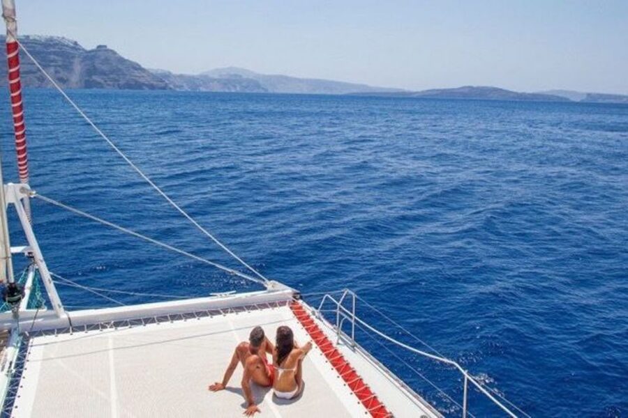 Santorini: Dream Catcher 5-hour Sailing Trip in the Caldera - Private bays, clear water, and the swimming stops