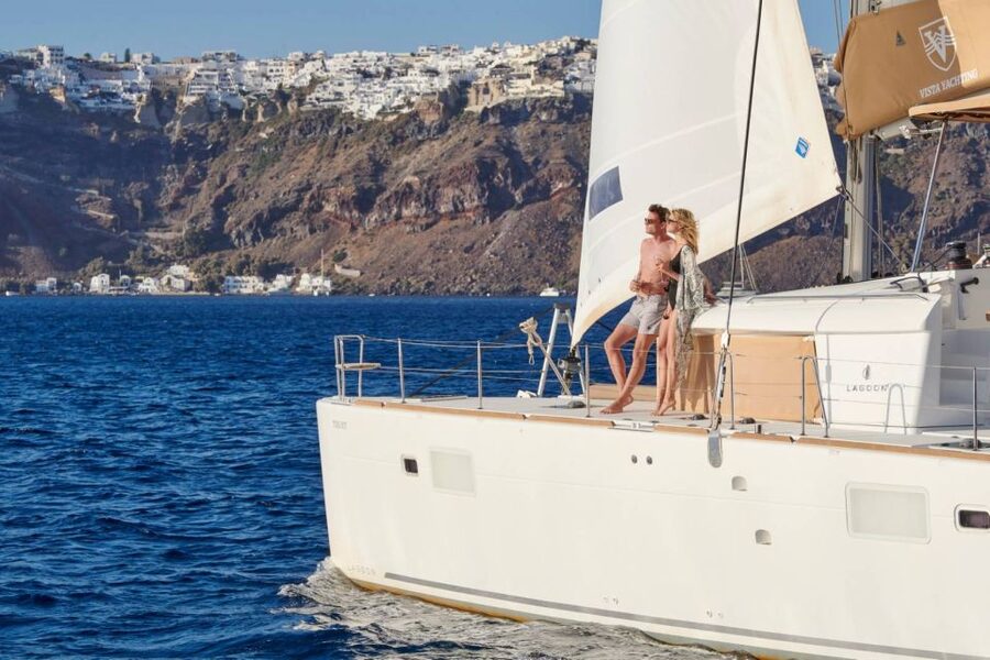 Santorini Gold Catamaran Cruise with Snorkel, BBQ & Open Bar - White Beach and the Venetian lighthouse