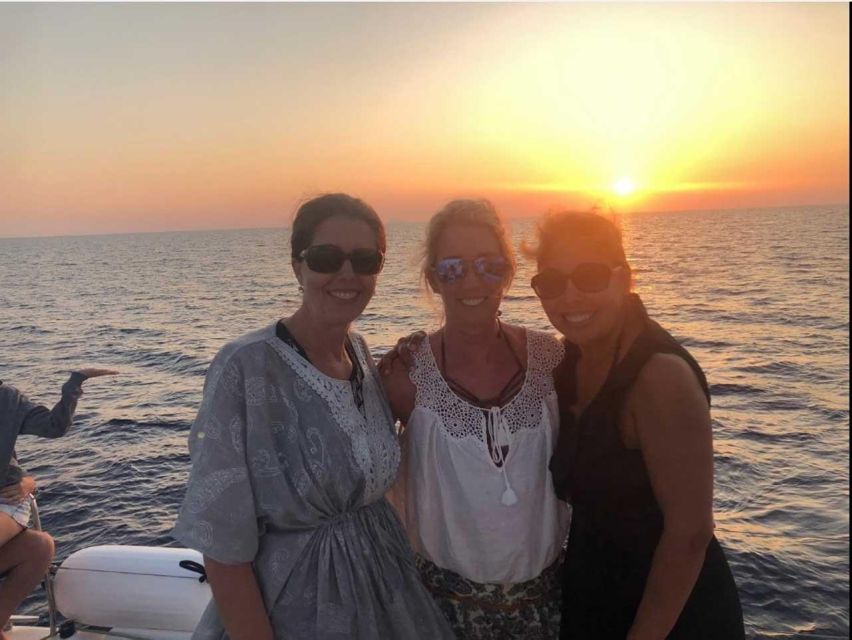 Santorini: Luxury Caldera Cruise with Full Greek Meal - Red Beach offers the best chance to get in the water