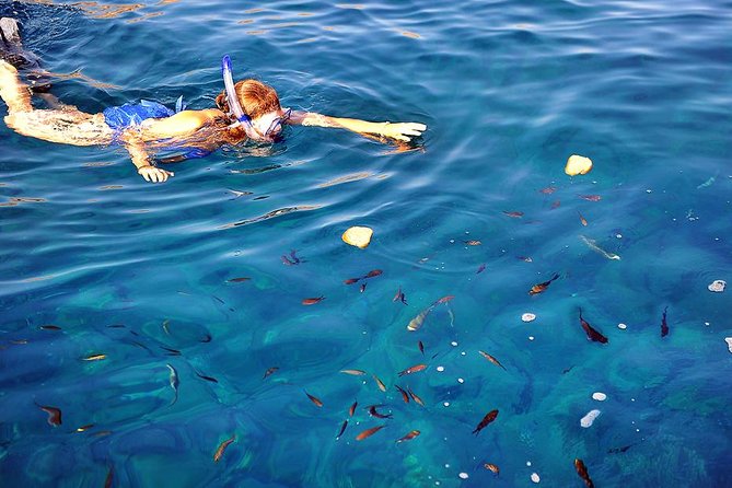 Santorini Luxury Catamaran Sunset Cruise with BBQ, Drink and Transfer - Sunset at sea, the real finale