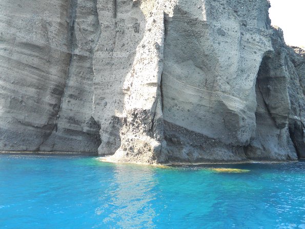 Santorini Luxury Catamaran Sunset Cruise with BBQ, Drink and Transfer - Crew service and comfort on board
