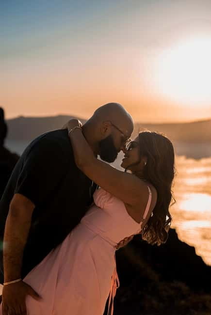 Santorini: Oia Private Couple Photoshoot with 35 Photos - Cancellation, timing, and booking details