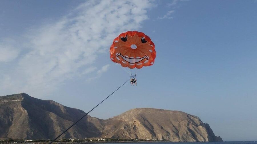 Santorini: Parasailing Flight Experience at Black Beach - The Speedboat Ride and Harness Setup