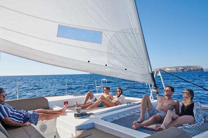 Santorini Platinum Catamaran Cruise with Meal, BBQ and Open Bar - The sunset option and the return journey