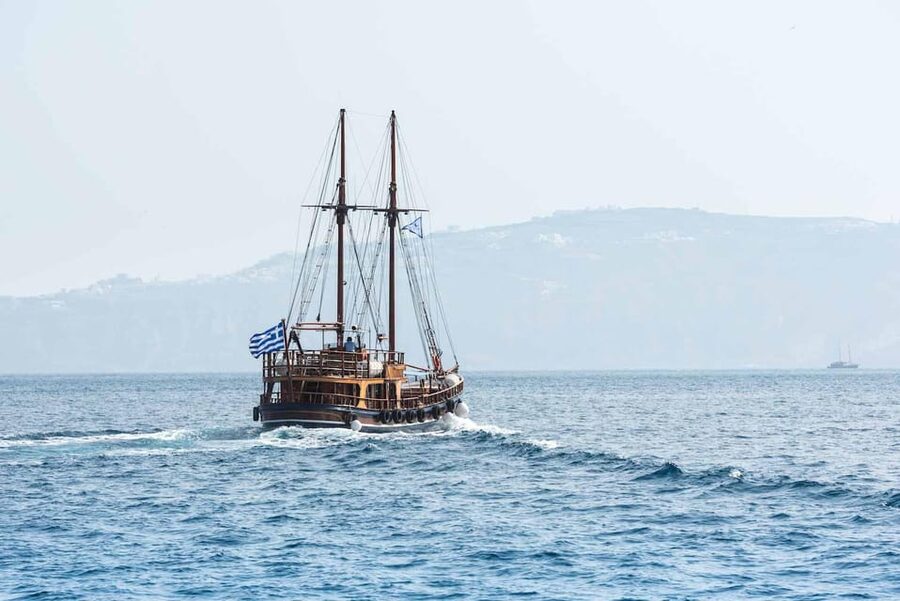 Santorini Port: 3 Hour Cruise to Volcano and Hot Springs - Sailing beneath Santorini’s cliffs