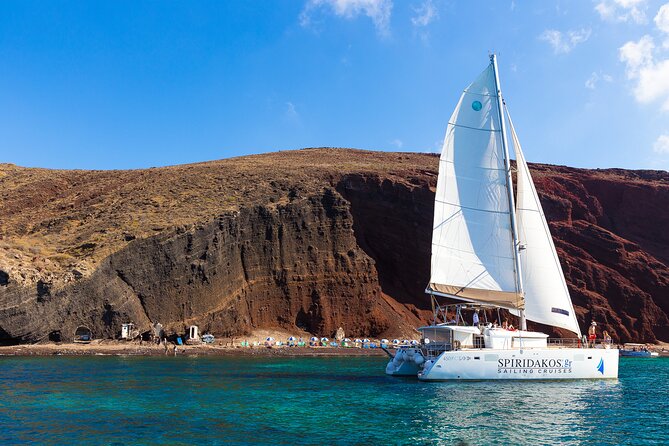 Santorini Private Catamaran Cruise with BBQ, Open Bar & Transfers - Why Santorini Looks Different From a Catamaran