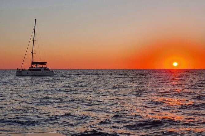 Santorini Private Catamaran Cruise with BBQ, Open Bar & Transfers - White Beach and Mesa Pigadia Swimming Time
