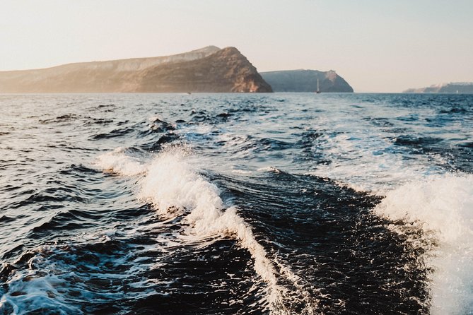 Santorini Private Catamaran Cruise with BBQ, Open Bar & Transfers - Day Cruise or Sunset Sailing?