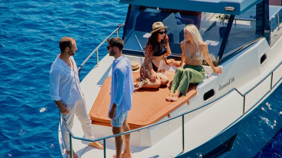 Santorini: Private Diamond 36 Motor Yacht Caldera Cruise - The crew and the private-group advantage