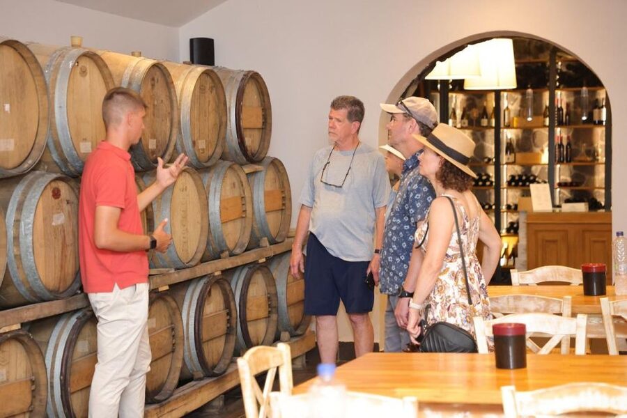 Santorini: Tour of Wineries with Wine Tasting & Food - The final winery and sunset over the caldera