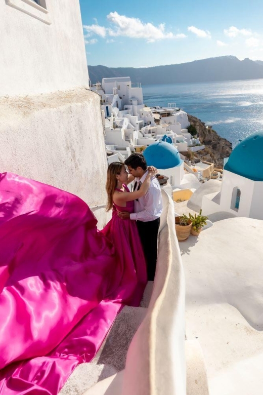 Santorini: Unique Flying Dress Photoshoot Experience - Oia’s Blue Domes and Photo Stops