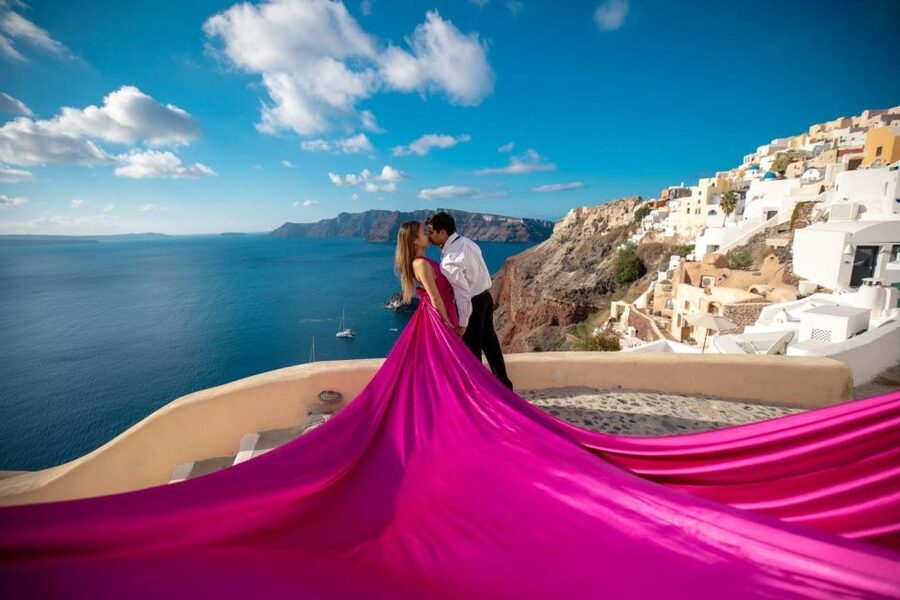 Santorini: Unique Flying Dress Photoshoot Experience - How the Photographer and Assistant Shape the Experience