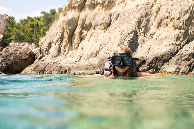 Sea Kayaking in Navarino Bay - The monolithic islet, natural arch, and sea caves