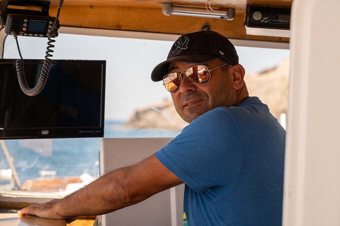 Shared Morning Cruise from Pollonia to Polyaigos - The first swimming stop: clear water and volcanic rock