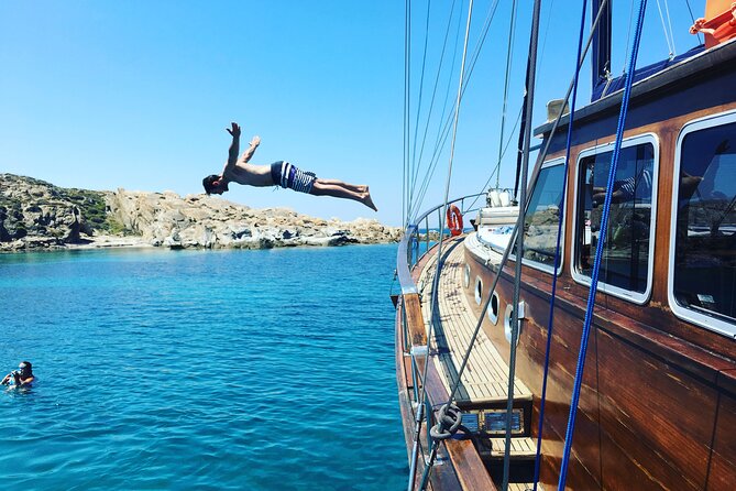 Shared Mykonos Sail Cruise to Delos and Rhenia Islands - Transfers, boarding, and practical details