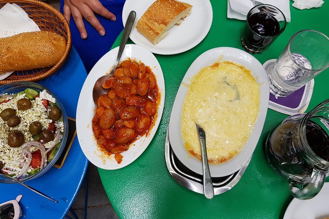 Small Group Greek Traditional Food Tour in Athens 20+ Tastings - A taverna meal with gyros, meze, and barrel wine