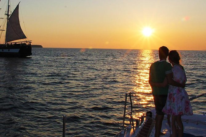 Sunset Sailing Catamaran Cruise in Santorini with BBQ and Drinks - Volcano views and the hot springs near Palea Kameni