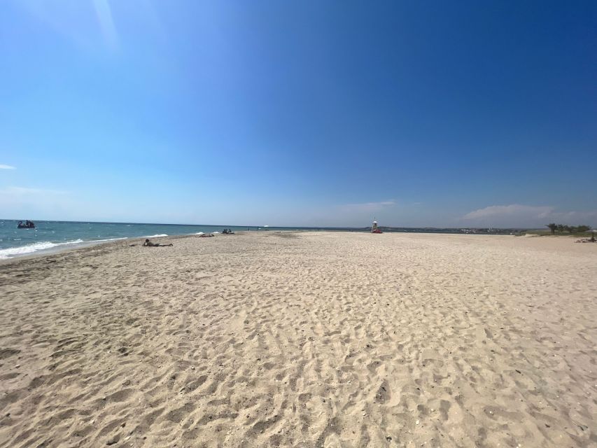 Thessaloniki: Halkidiki Beach-Hopping with Swimming - The second stop, from quiet bay to organized beach