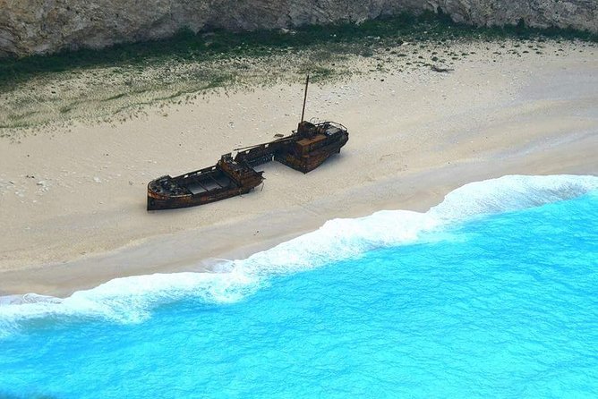 Zakynthos : One day small group tour to Navagio beach Blue Caves & top view - Guides can make or break the experience