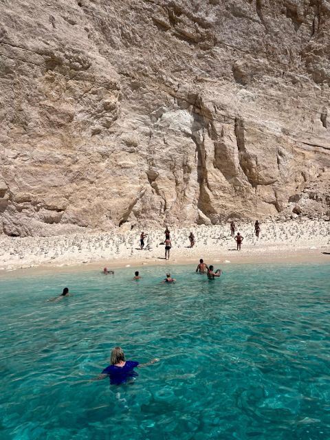 Zante: Half-Day Tour to Navagio, Blue Caves & White Beach - The Blue Caves in bright midday water